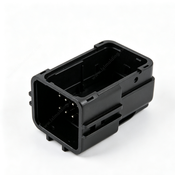 100 Black rectangular multi‑pin connector socket housing with exposed terminals, inner locking slots and deep wiring cavity