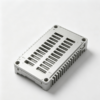 Silver finned heat dissipation electronic enclosure with ventilation slots and corner mounting holes