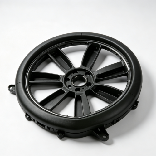 Black large‑diameter spoked circular molded plastic frame with central bore and mounting lugs