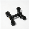 Black dual‑pivot swivel plastic clip bracket with anti‑slip textured paddles