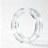 Fully transparent molded circular plastic ring spacer with square circumferential locating slots
