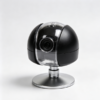 Black dome camera housing with a clear vertical window band over the lens and a knurled collar on a round base