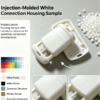 Injection molded white connection housing sample with plastic pellets and color swatches for assembly component development