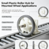 Plastic roller hub mounted on a shaft for a compact wheel and roller assembly, shown on a light conveyor line