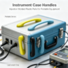 Molded plastic handles on a portable instrument case, showing lightweight pull grips for field equipment