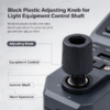 Black plastic adjusting knob for a light equipment control shaft, shown for hand operation