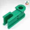 U-shaped bracket at an angle, with the open channel, the two pin holes and the base rail in view
