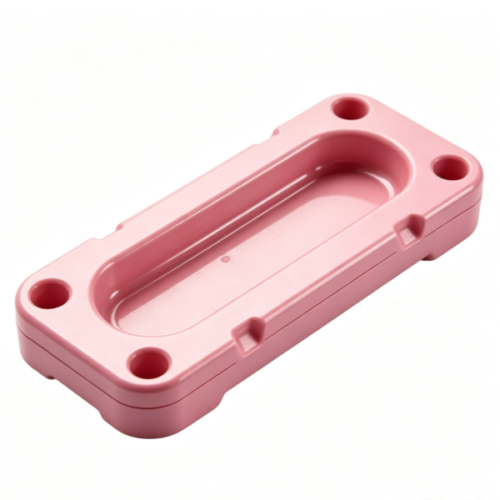 Pink glossy rectangular plastic housing with deep central recess cavity, four corner mounting holes and side interlock lugs