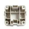 Off‑white partitioned multi‑cell plastic module casing with dividing ribs and dual internal connector sockets