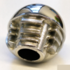 Ball foot close up standing on its open end, showing the four slots, the ribs and the flat collar below the polished ball