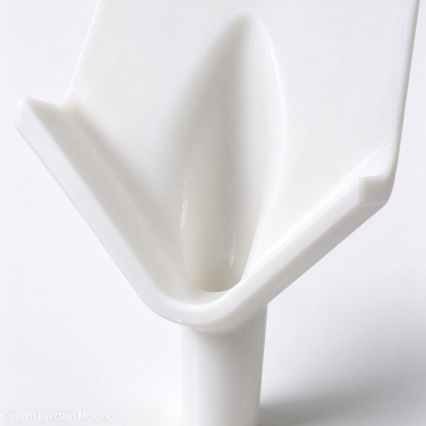 297 (2) Drainage nozzle close up, the smooth V trough blending into the round spout with no step inside the flow path