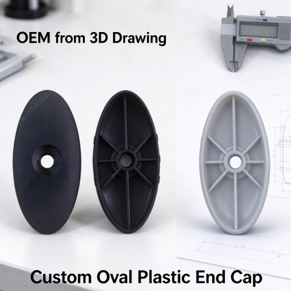 Oval plastic end cap closing the end of an equipment profile, shown on a machine frame