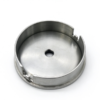 Steel flanged cover seen from inside, showing the dish, the center hole in the floor and the keyed notch in the skirt