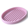 Silicone drain pad in pink, the oval base with straight ribs across it and a raised rim all round