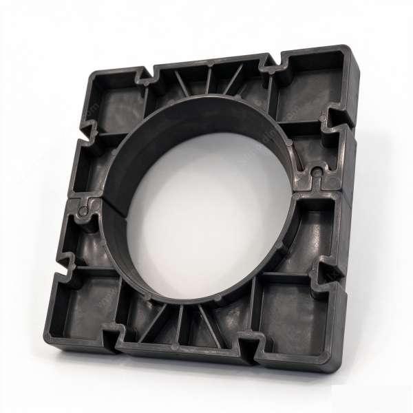 326 Modular mounting frame in black, a square molded frame with a central bore, rib lattice and snap tabs on the edges